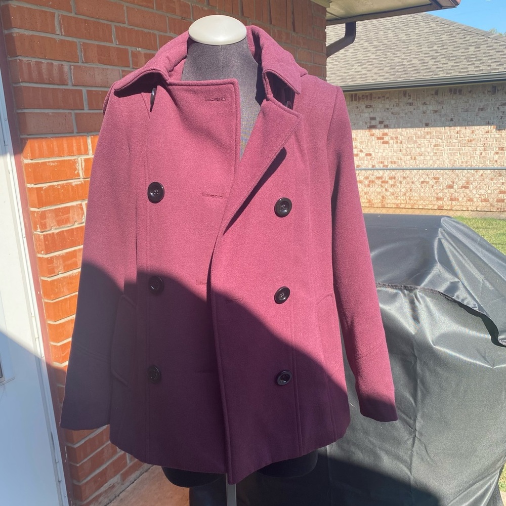 INTL details Plum Peacoat